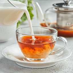 Britannia Dairy Whitener in a Cup of Lukewarm Tea